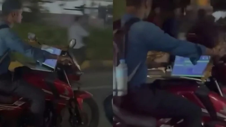 हैदराबाद में बाइक पर लैपटॉप लेकर काम करता दिखा युवक, वीडियो वायरल होते ही छिड़ी कॉरपोरेट दबाव पर बहस