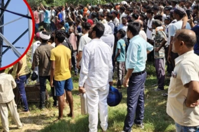 बलिया में अनोखा विरोध: परिवार पर मुकदमा दर्ज कराने के लिए टावर पर चढ़ा युवक, मचा हड़कंप